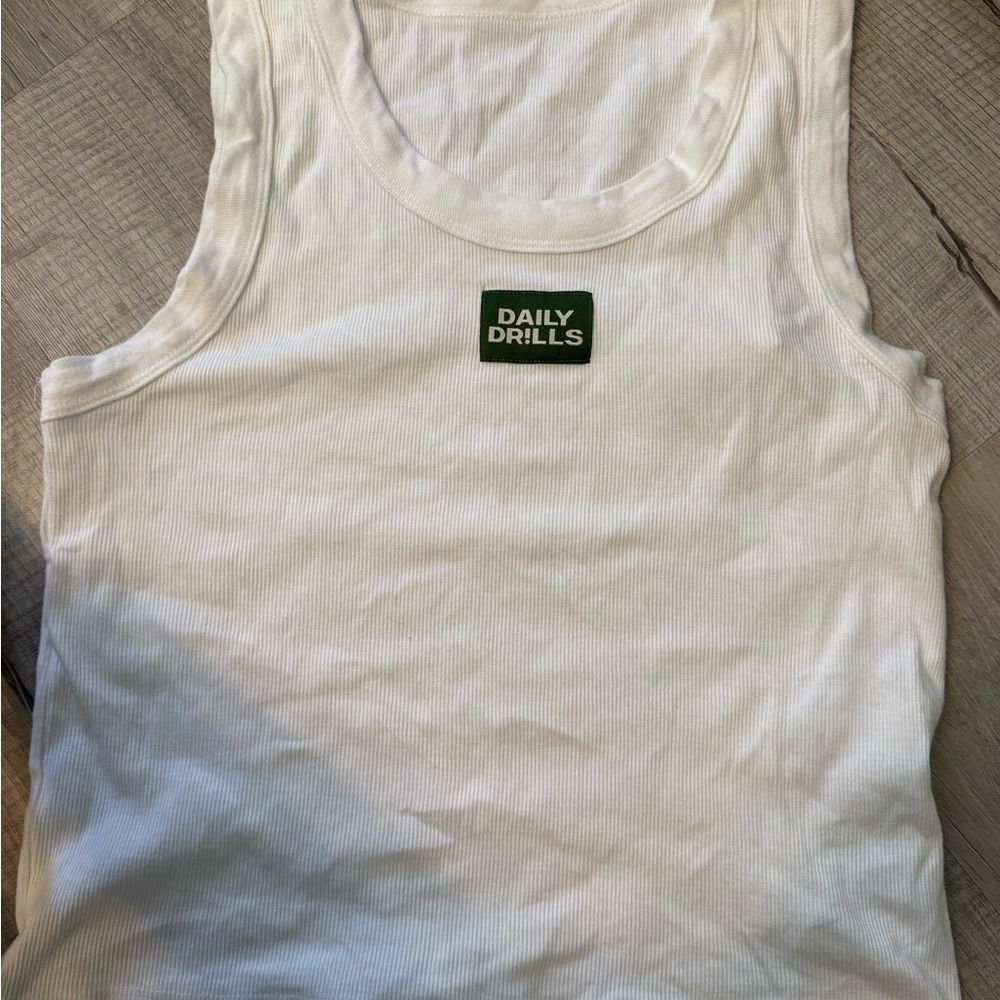 Daily Drills White Ribbed Tank with Dark Green Logo Patch